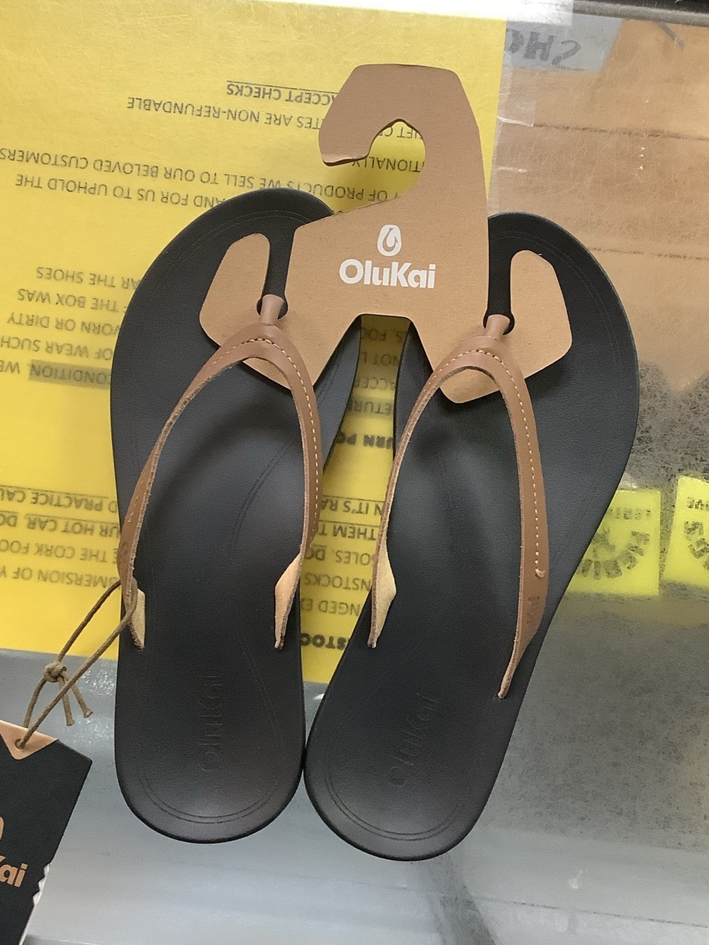 OluKai Women’s Brown Strap Black Footbed Sandals